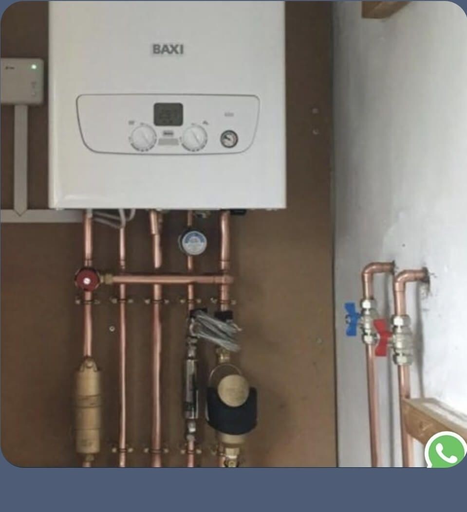 New Baxi combi boiler installation with neatly installed copper pipework in Crowborough
