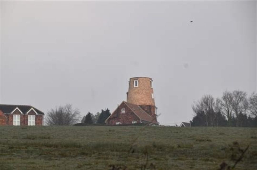 “Walter's Mill, a historic five-storey tower mill in Mark Cross, East Sussex.”