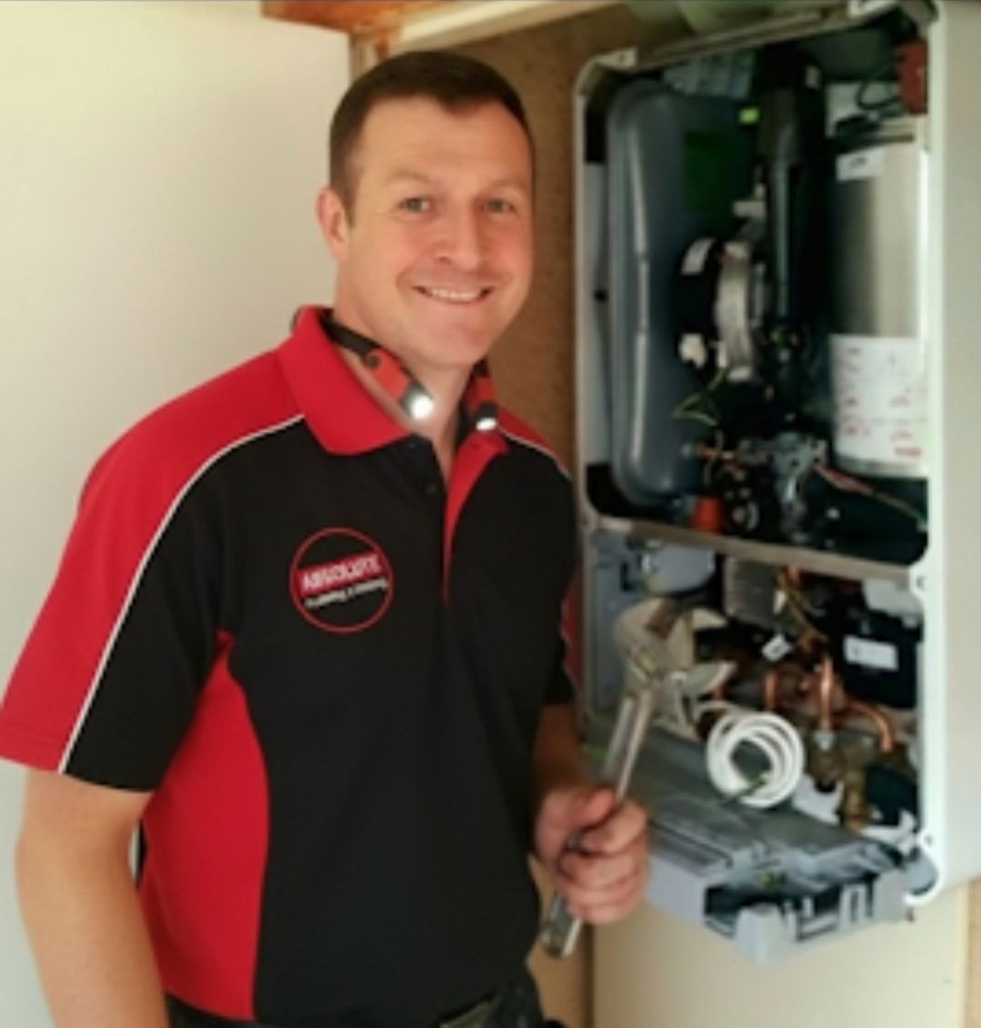 Gas Safe engineer carrying out a boiler repair in Crowborough home