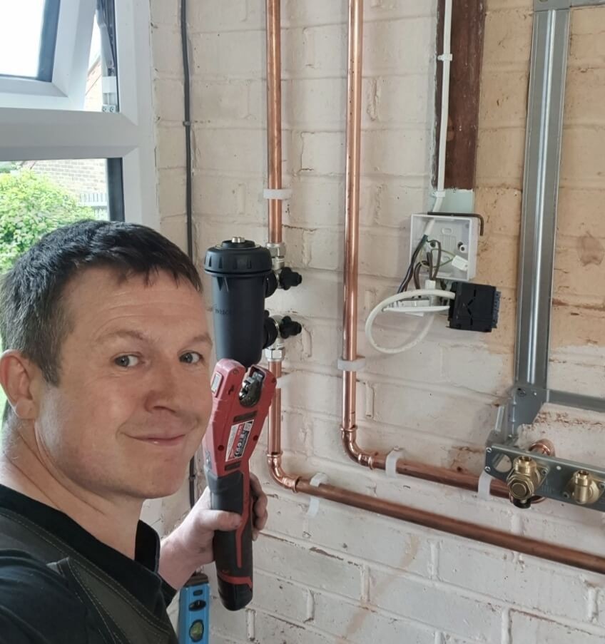 Daniel from Absolute Plumbing and Heating completing new copper heating pipework installation in Tunbridge Wells
