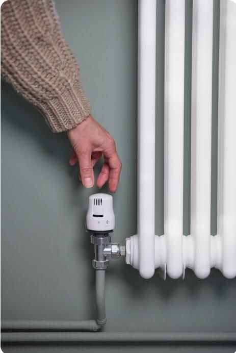 Installing a thermostatic radiator valve (TRV) on a central heating system in Crowborough.