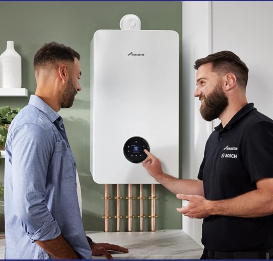 Local boiler installer discussing quote with homeowner in Tunbridge Wells