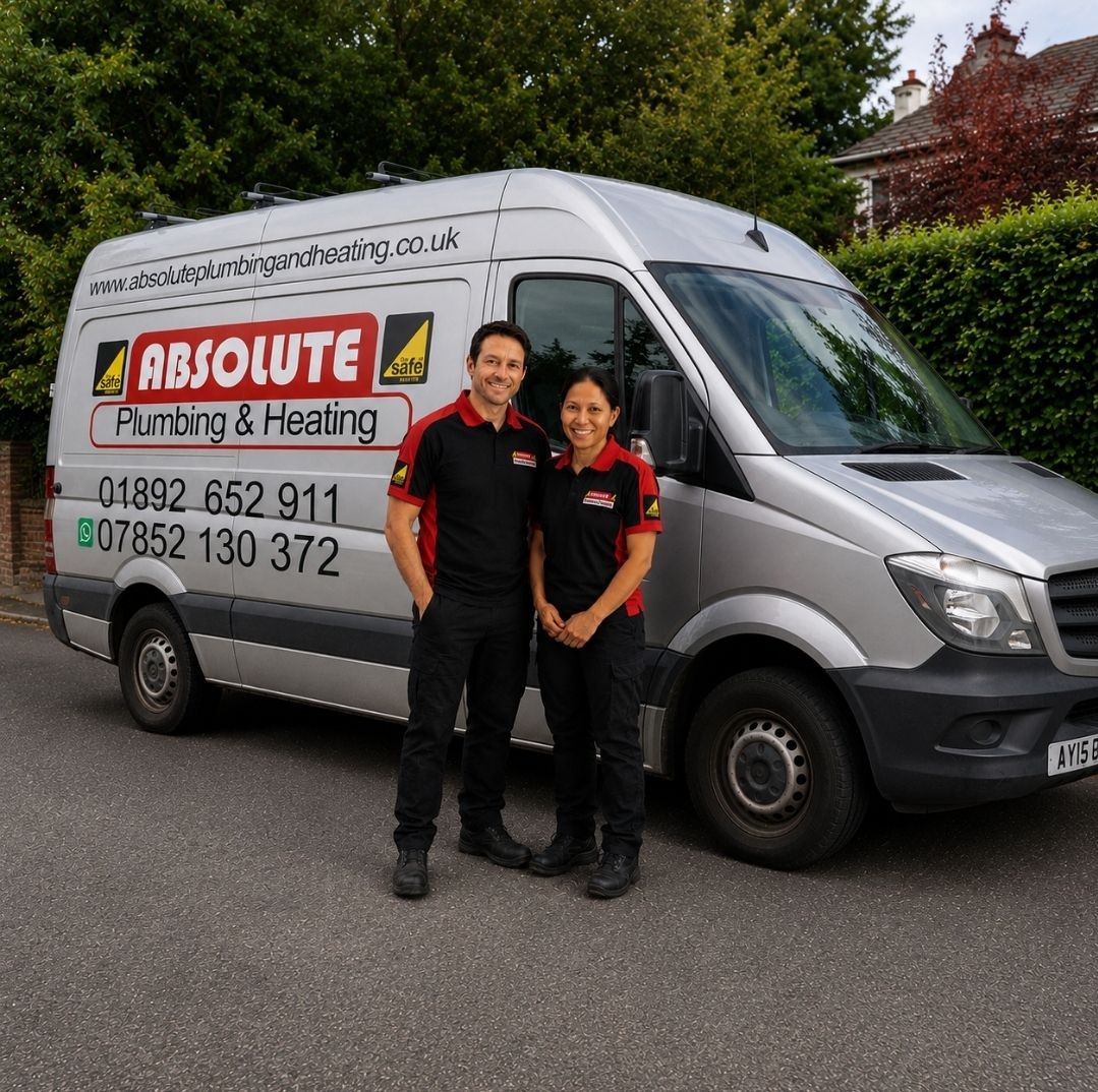 "Absolute Plumbing & Heating Worcester Accredited boiler installers in Crowborough standing in front of their company van."