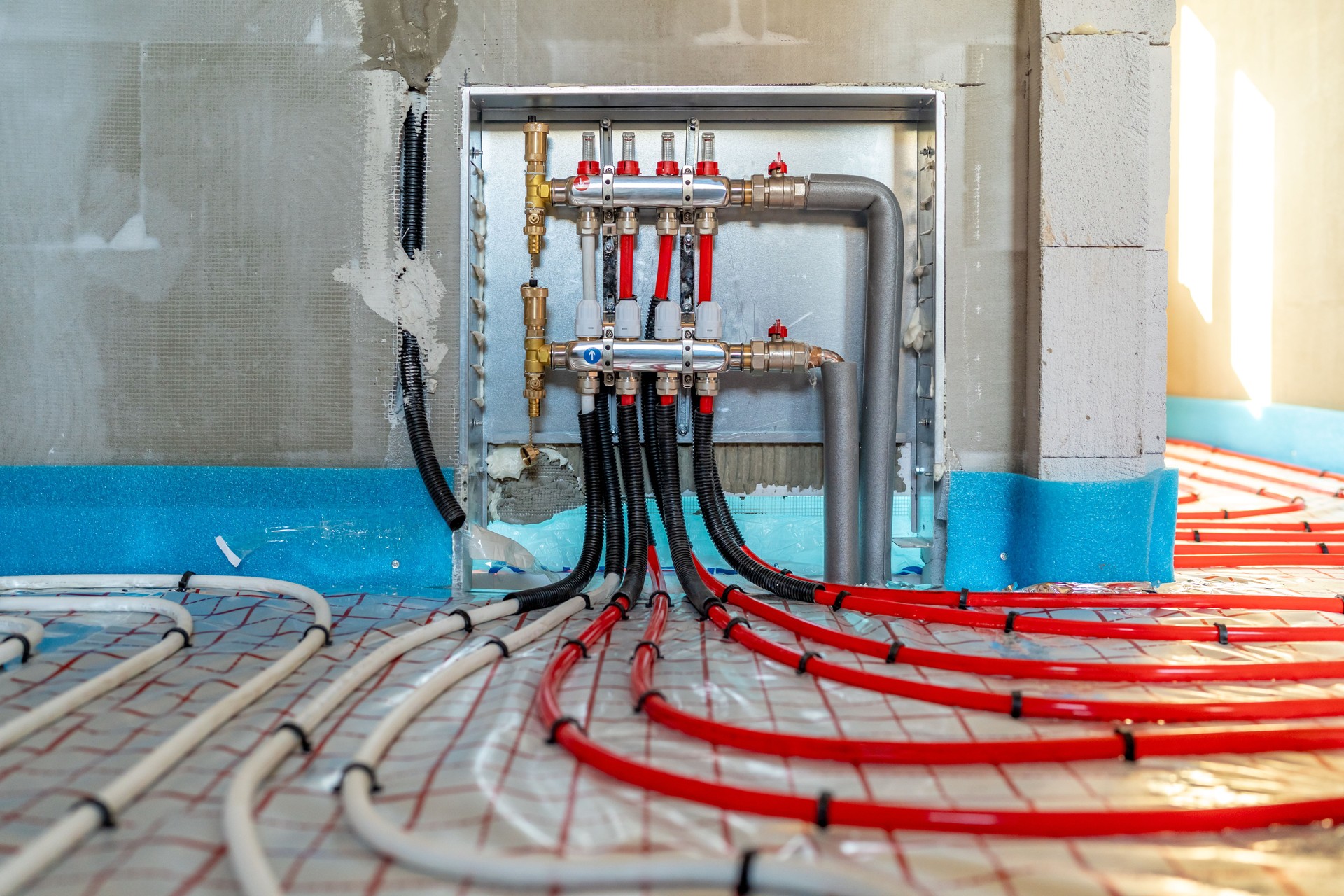 Underfloor heating system being installed in a new building